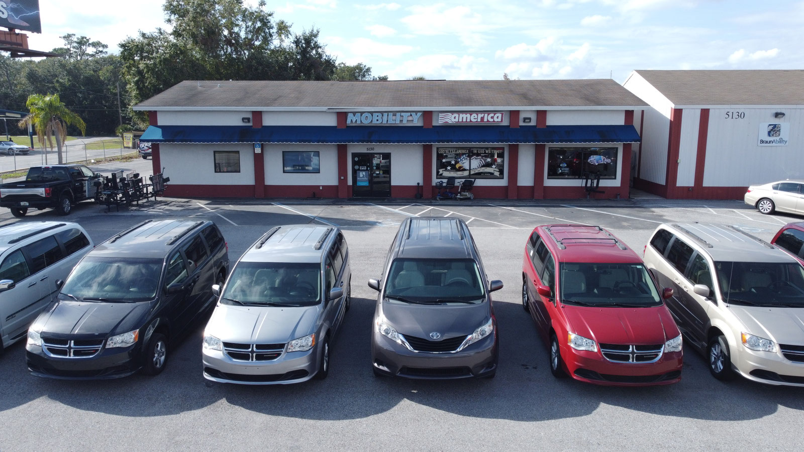 Mobility America showroom exterior with wheelchair vans parked in front, Lakeland FL