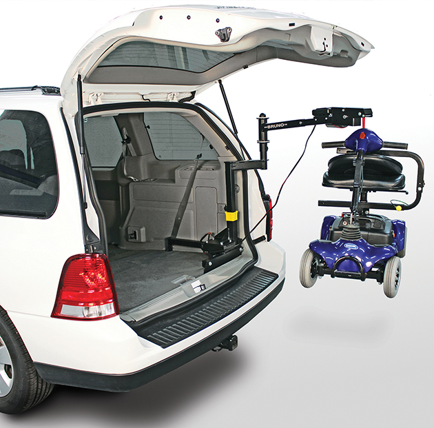 Bruno Space Saver lift loading a mobility scooter into the rear of an SUV