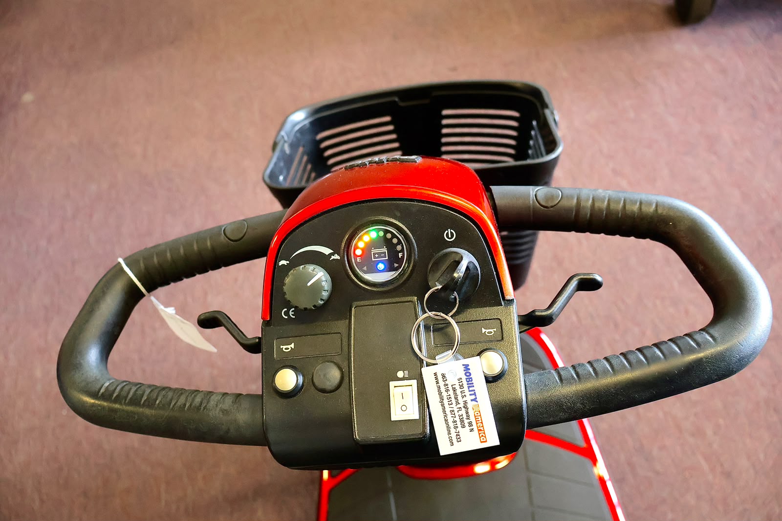 Pre-owned blue Golden LiteRider 3-wheel mobility scooter, photographed at the Mobility America showroom in Lakeland