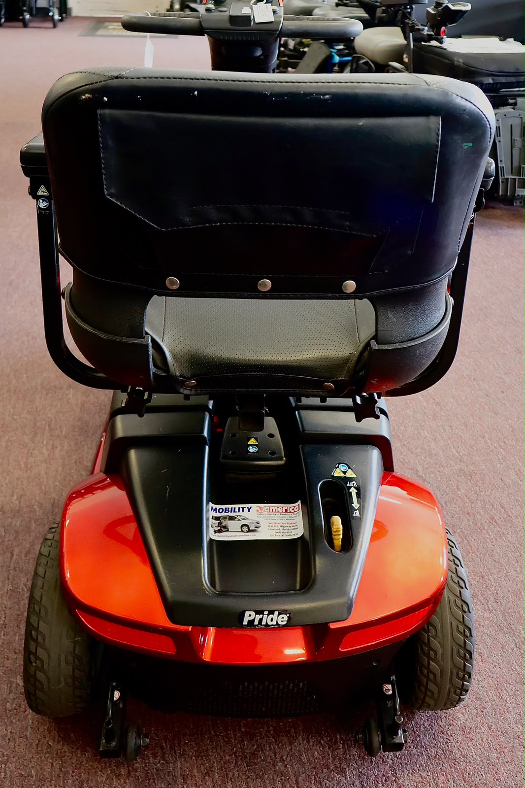Pre-owned blue Golden LiteRider 3-wheel mobility scooter, photographed at the Mobility America showroom in Lakeland