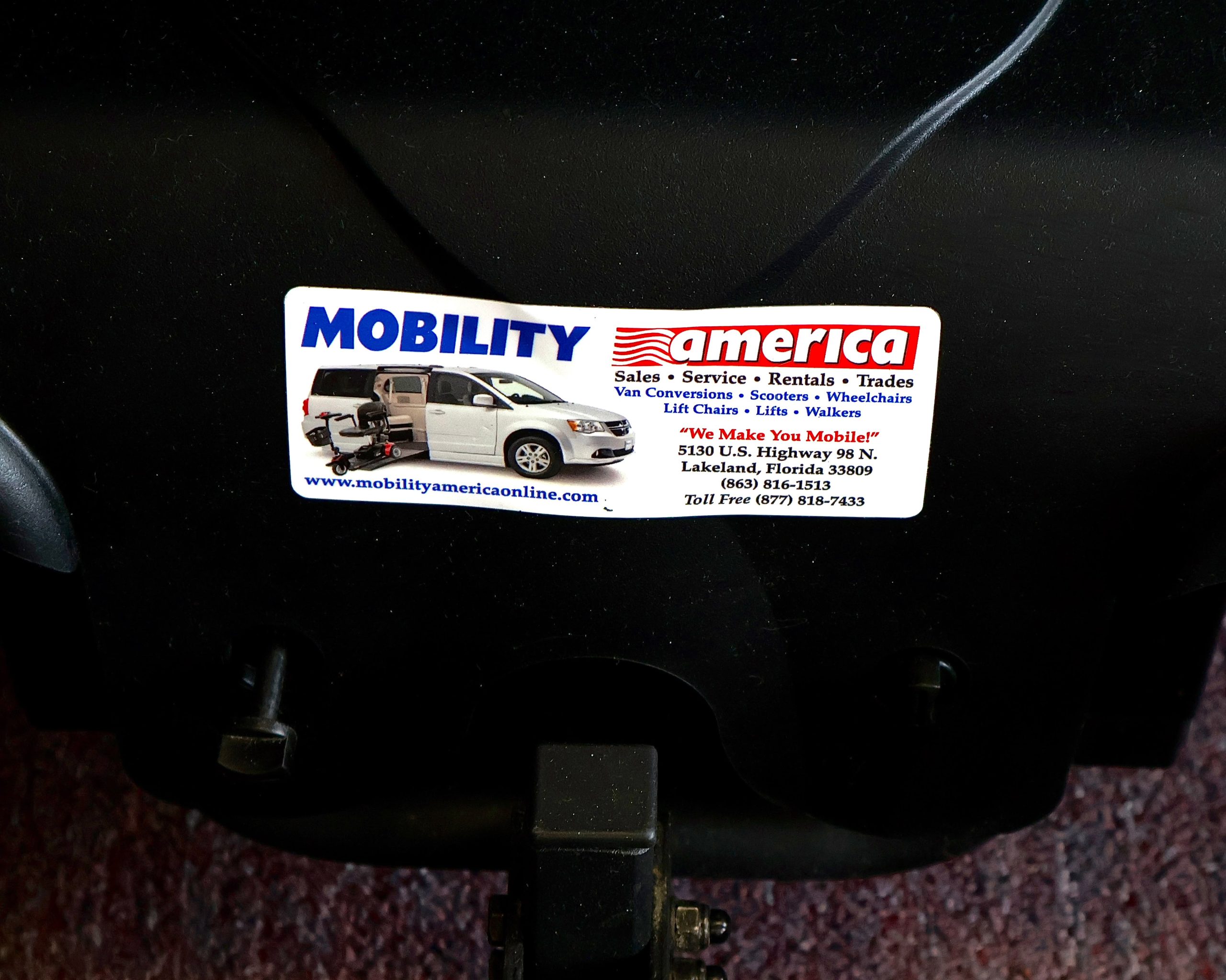 Pre-owned Merits Vision Sport power wheelchair, photographed at the Mobility America showroom in Lakeland