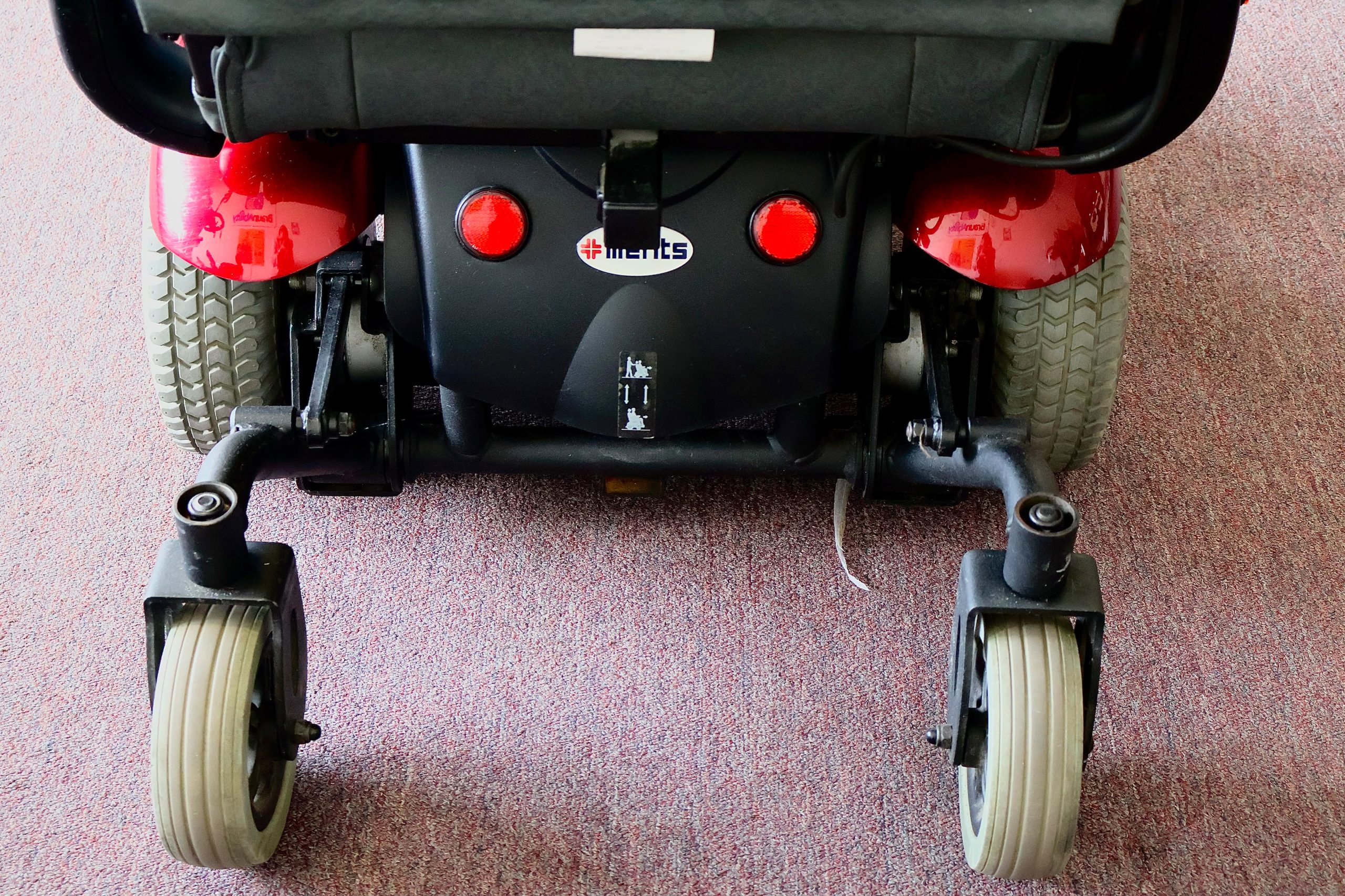 Pre-owned Merits Vision Sport power wheelchair, photographed at the Mobility America showroom in Lakeland