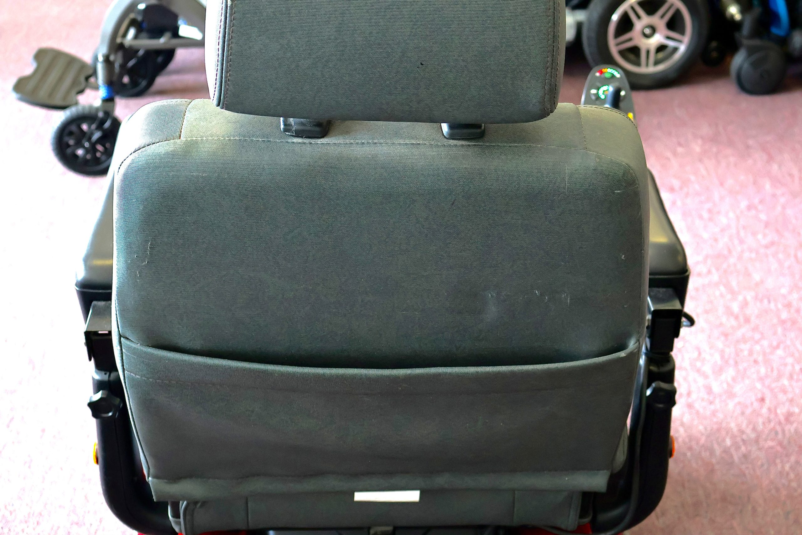 Pre-owned Merits Vision Sport power wheelchair, photographed at the Mobility America showroom in Lakeland