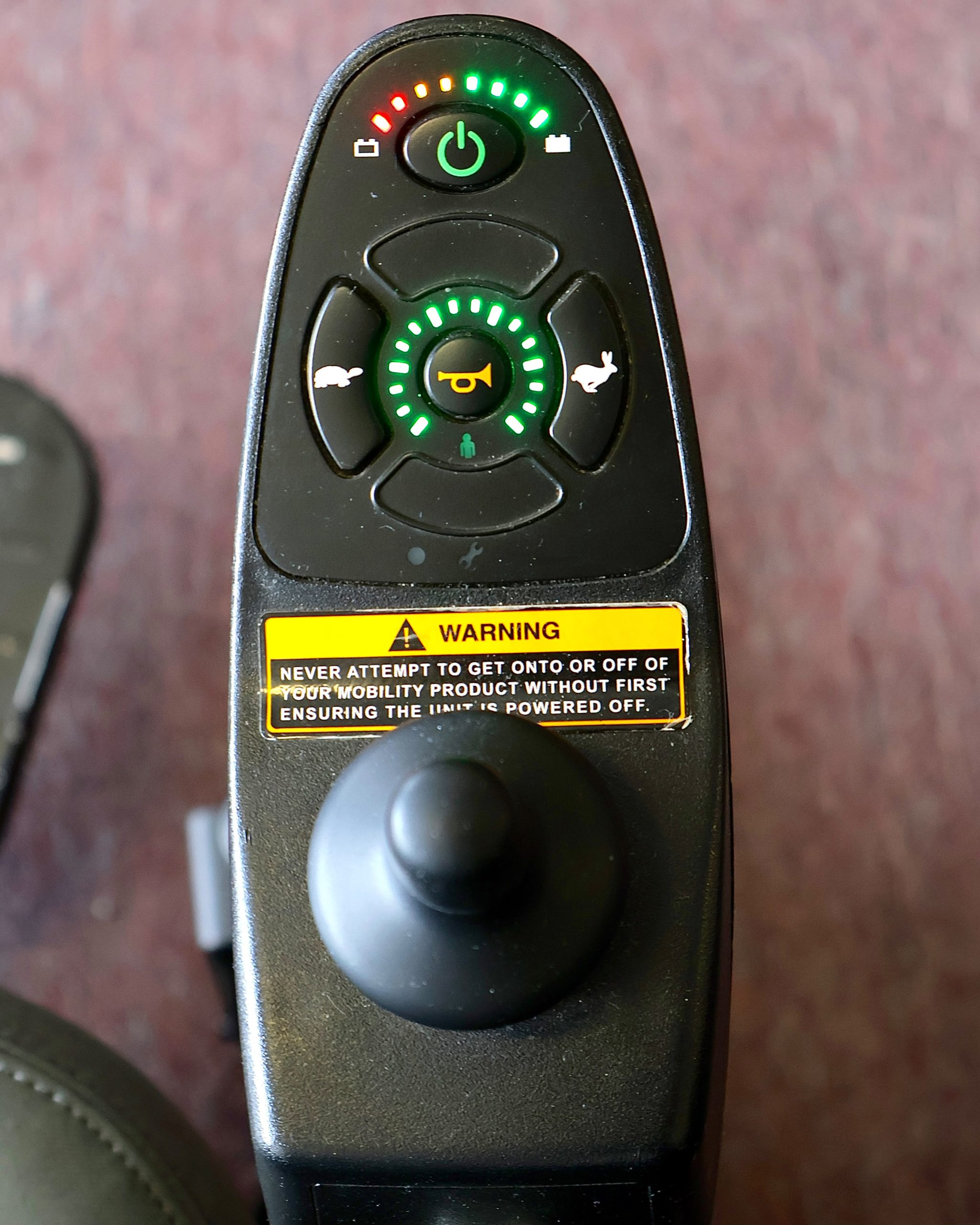 Pre-owned Merits Vision Sport power wheelchair, photographed at the Mobility America showroom in Lakeland