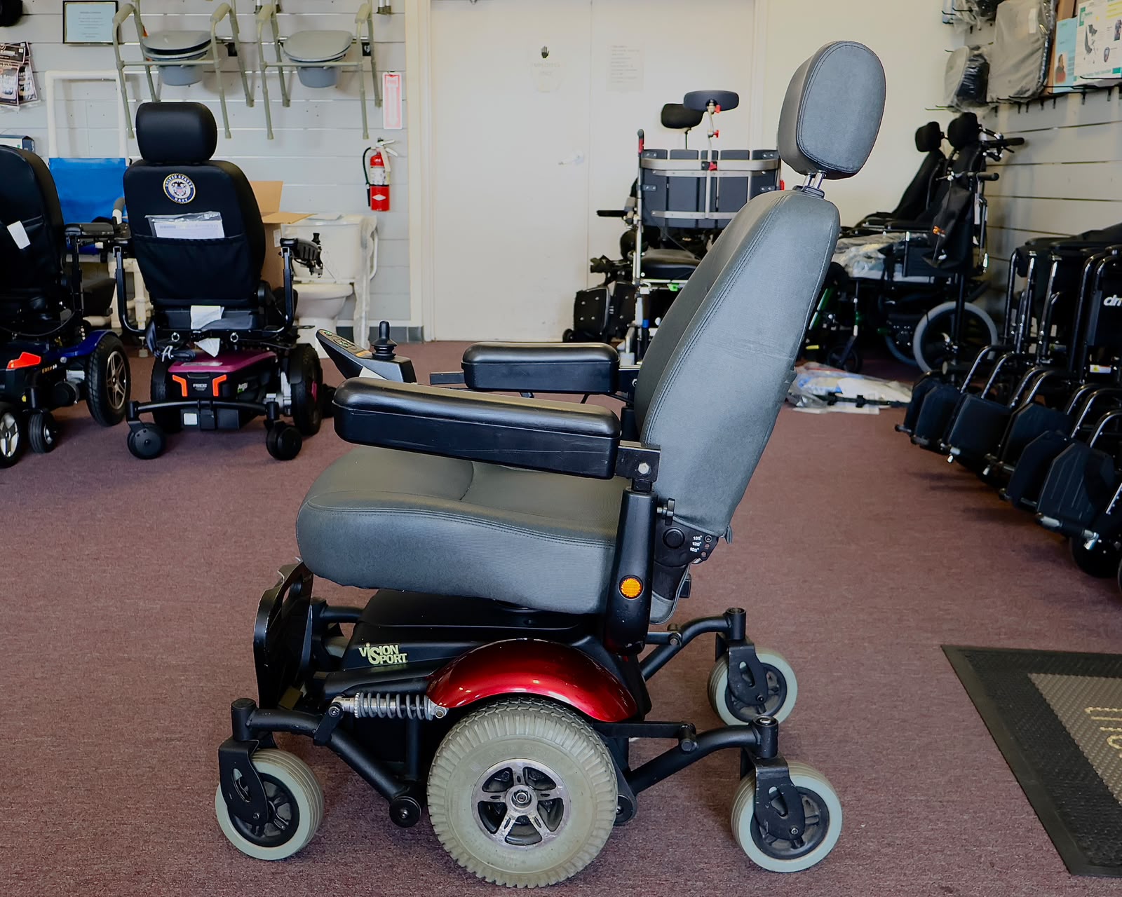 Pre-owned Merits Vision Sport power wheelchair, photographed at the Mobility America showroom in Lakeland