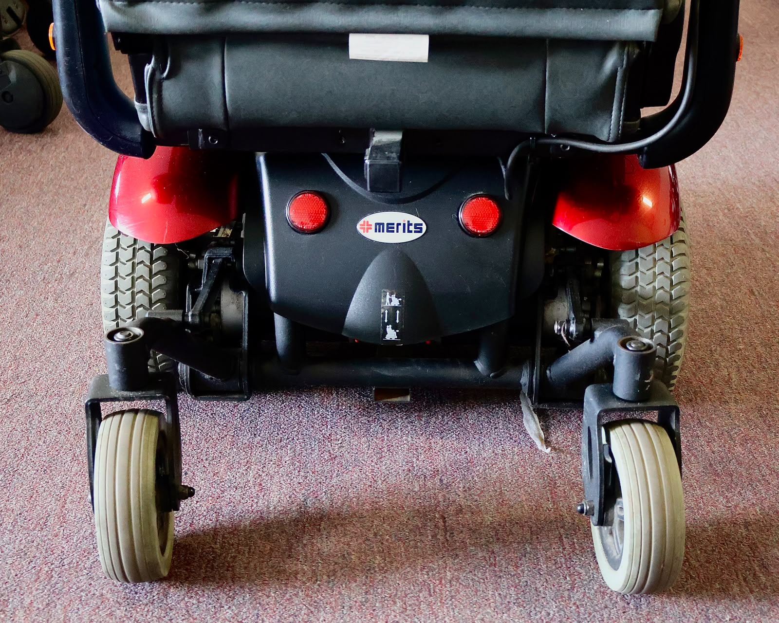 Pre-owned Merits Vision Sport power wheelchair, photographed at the Mobility America showroom in Lakeland