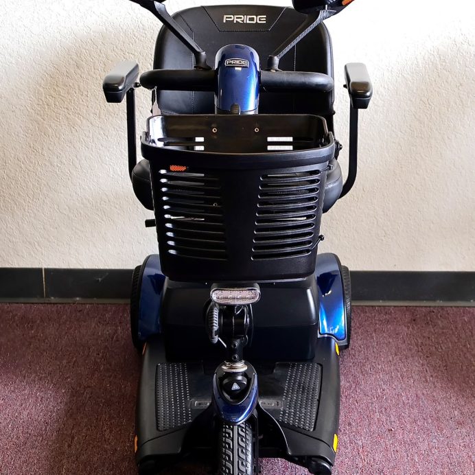 Pre-owned blue Pride Go-Go Sport 3-wheel mobility scooter, photographed at the Mobility America showroom in Lakeland
