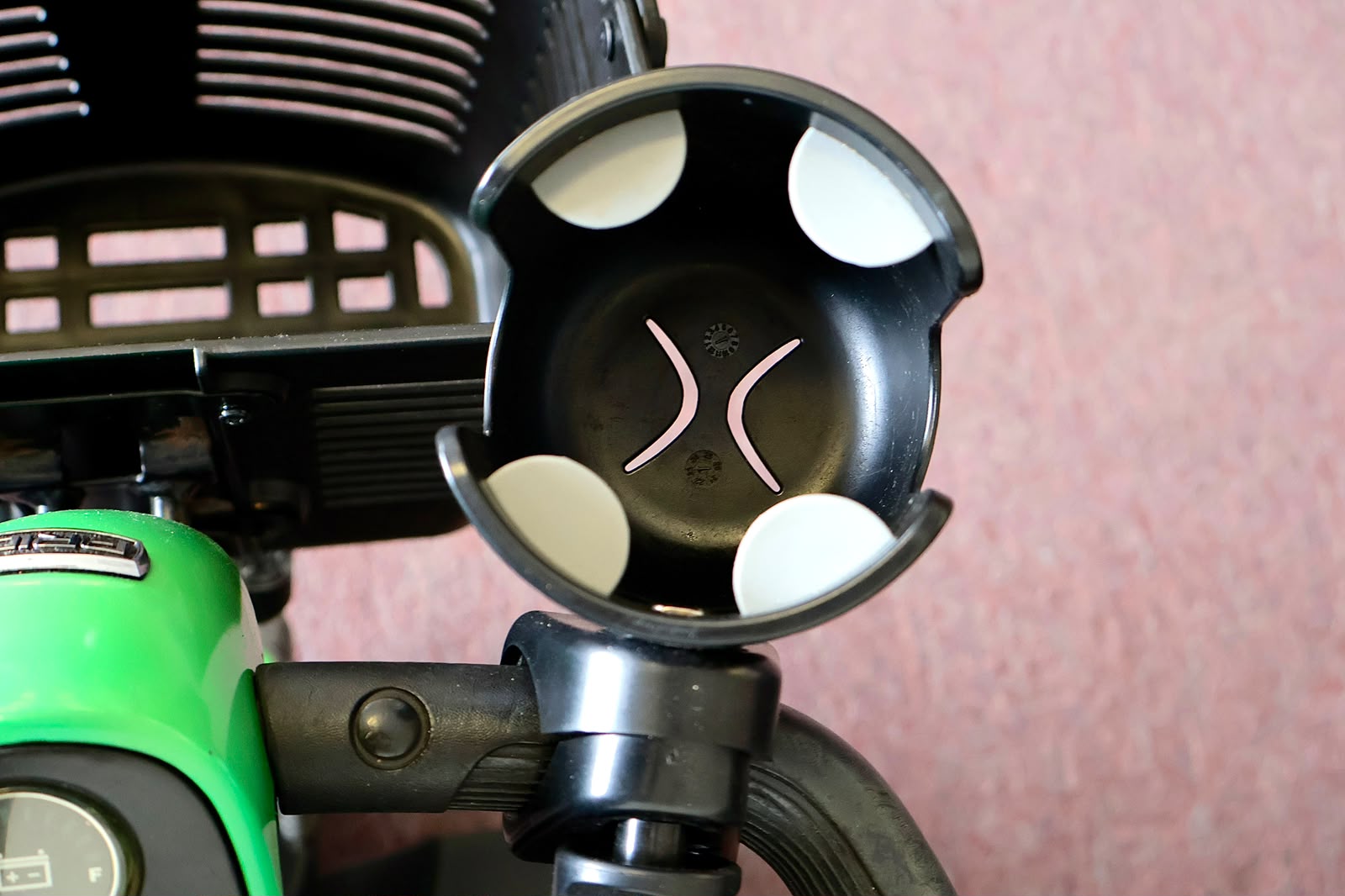 Pre-owned green Pride Go-Go Sport 3-wheel mobility scooter, photographed at the Mobility America showroom in Lakeland