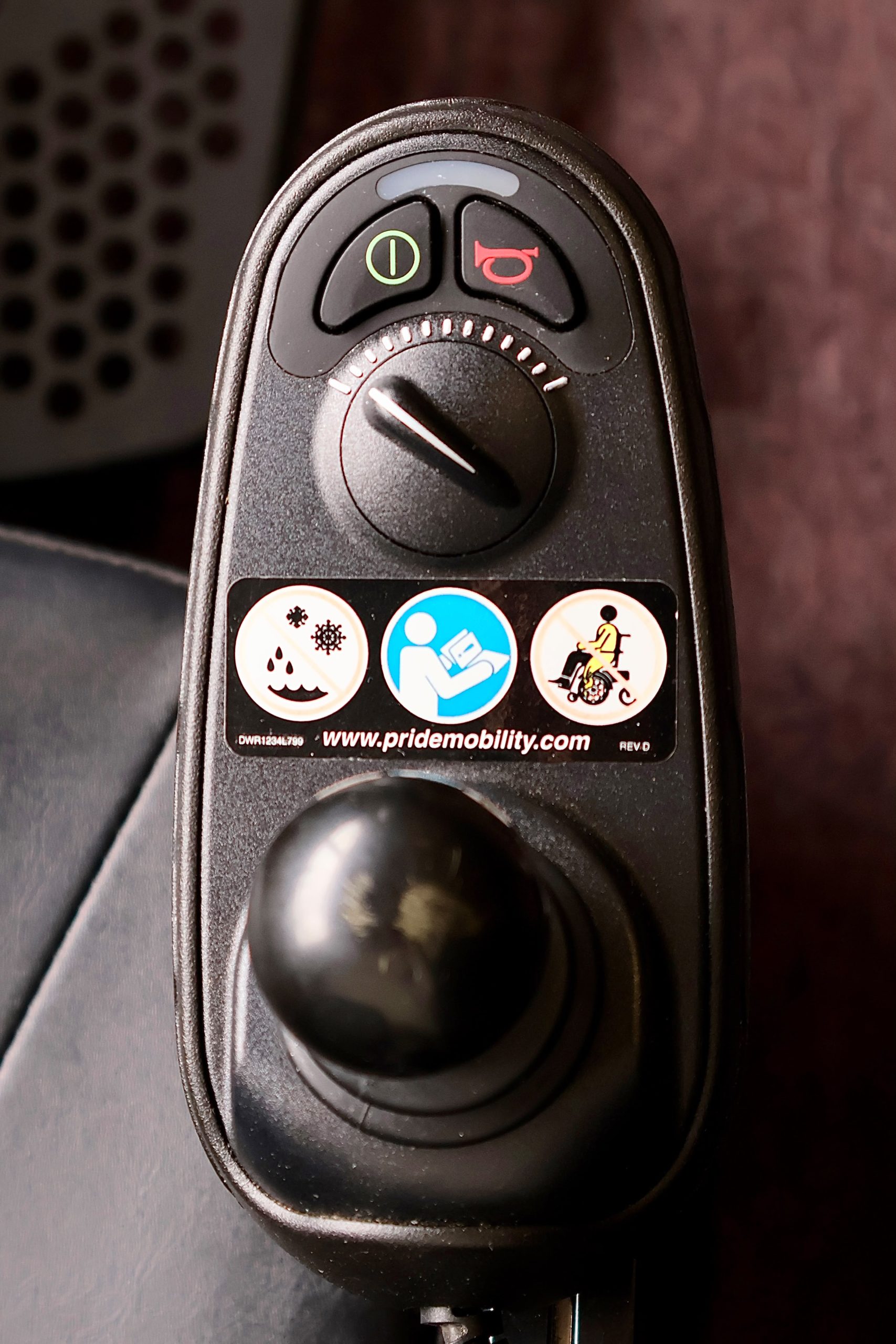 Pre-owned blue Pride Jazzy power wheelchair, photographed at the Mobility America showroom in Lakeland