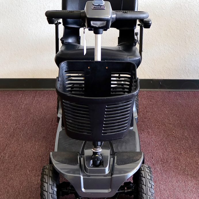 Pre-owned grey Pride Revo 2.0 4-wheel mobility scooter, photographed at the Mobility America showroom in Lakeland