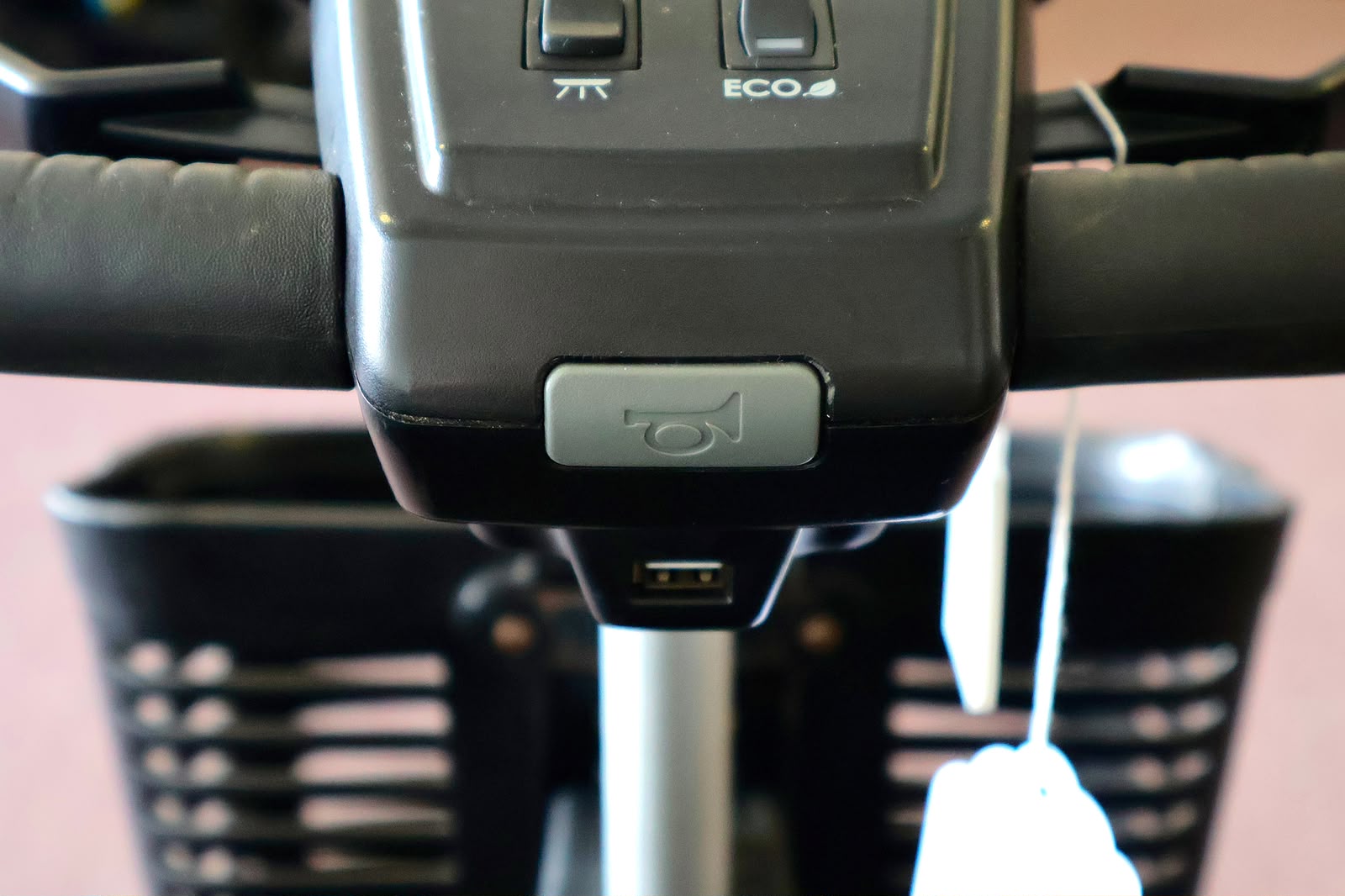 Pre-owned grey Pride Revo 2.0 4-wheel mobility scooter, photographed at the Mobility America showroom in Lakeland