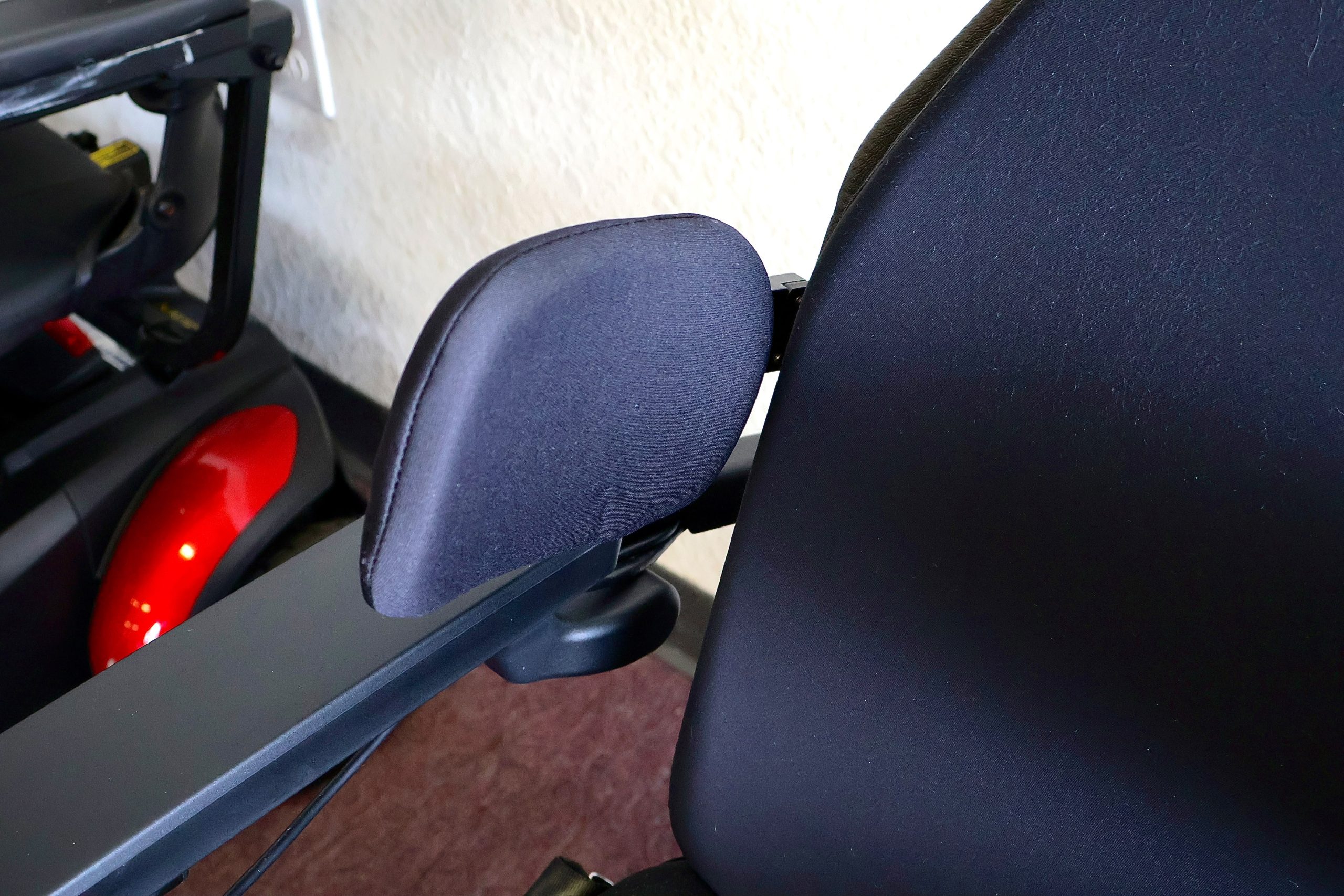 Pre-owned Quantum iLevel rehab power wheelchair in digital camo, photographed at the Mobility America showroom in Lakeland