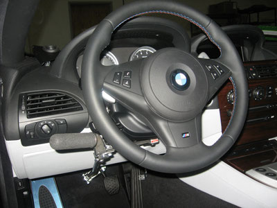 A parking brake extension allowing the brake to be set by hand instead of by foot