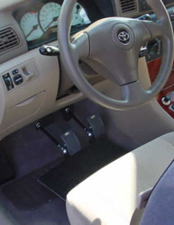Gas and brake pedal extensions bringing both pedals closer to the driver