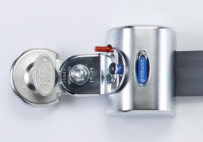 A Q'Straint QRT MAX fully automatic knobless wheelchair retractor