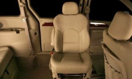 A six-way powered transfer seat base that moves front to back, up and down, and swivels