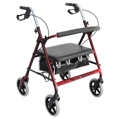 A red heavy-duty four-wheeled rollator with a padded seat, backrest, and underseat storage basket